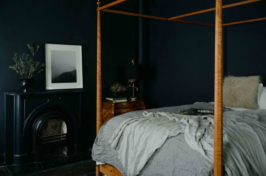 “This guest room is entirely Ellen and Elliot’s doing and one of the first rooms they tackled,” Bethany says. “They installed the stamped tin ceiling themselves and painted it black for a cozy contrast to the high ceilings and spaciousness of the home. It is so welcoming, you’d forgive a guest for never wanting to get out of bed!”
