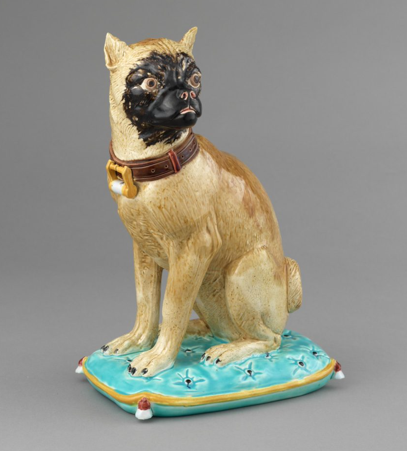 A c. 1880 majolica dog from Britain’s Joseph Holdcroft.

