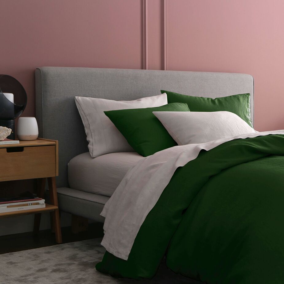 Sijo’s French linen and eucalyptus bedding comes in a variety of solid colors designed to be mixed or matched. Here the French Linen Duvet Cover in Forest  (another best-seller) complements the French Linen Sheet Set in Blush. 
