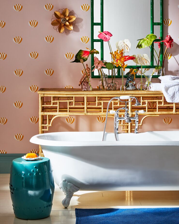 A turquoise garden stool will brighten any bathroom.
