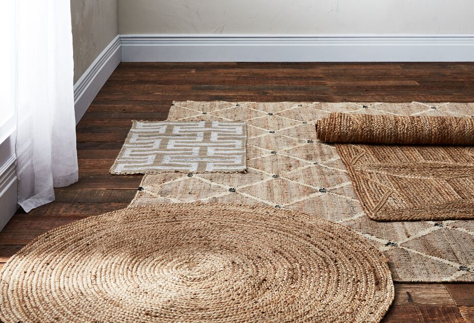 Shown above: the Kali Jute Rug (top), the Peyser Jute Rug (right), and the Mintaka Round Jute Rug (bottom).
