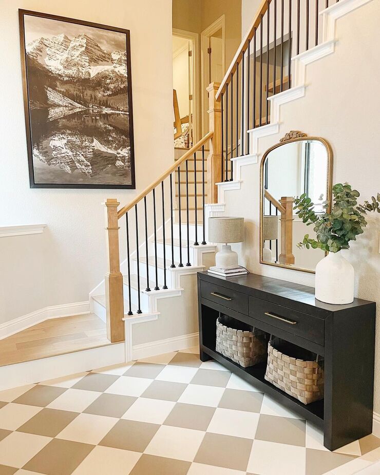 In this entry designed by Jesse Leigh Bunton, the Bridgitte Ornate Wall Mirror in Antiqued Gold ensures that the space doesn’t feel too contemporary.
