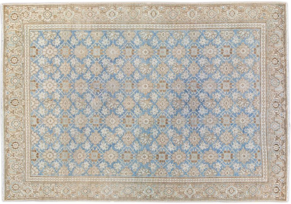 This antique Tabriz rug features a herati pattern. 
