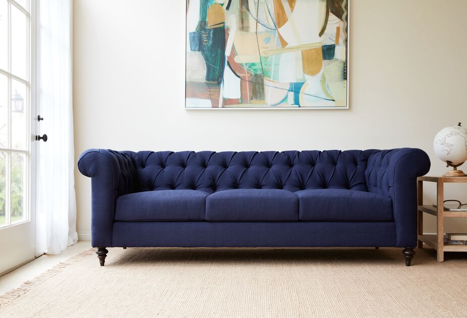 The Chatsworth Sofa in Navy Performance Linen. Find the artwork here.
