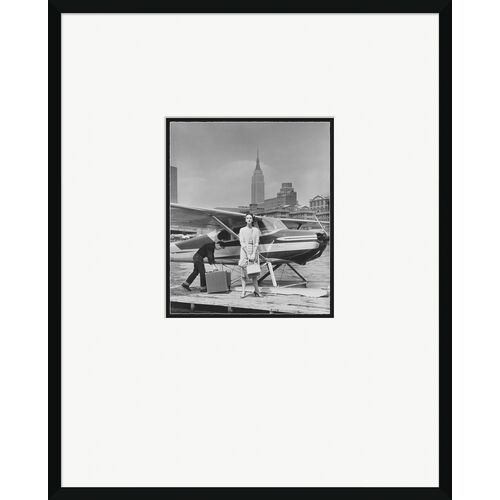 Vogue Magazine, "Woman by a Seaplane", John Rawlings, May 15, 1954 Photograph