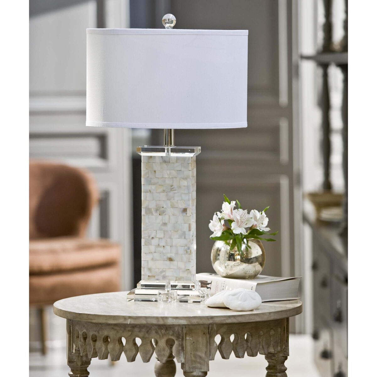 Mother-of-pearl gains extra luminosity when used on lighting, as with this table lamp.  

