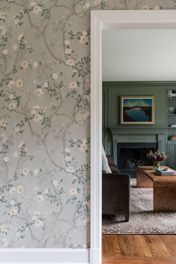 Designer Kate Figler worked with her clients to incorporate feminine and masculine aesthetics. The nature-inspired greens and blues helped create a cohesive look they both loved. Find a similar rug here. Photo by Allison Elefante.
