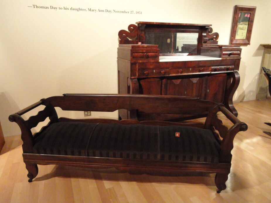 Both pieces shown here, at the North Carolina Museum of History, are by Thomas Day. The front design is one of his most famous: the Day Bed, notable for its use of negative space. Photo: Daderot/Wikimedia.
