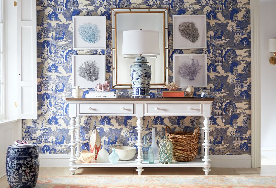A mirror can be a refreshing addition to a gallery wall, offering a place where the eye can rest amid the myriad delightful distractions.  
