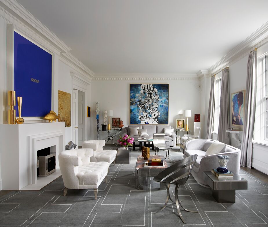 In this Park Avenue living room, the seating is positioned to encourage conversation as well as contemplation of the clients’ art collection, which includes works by Richard Prince (over the mantel) and George Condo (above the sofa).  Photo by Richard Powers.
