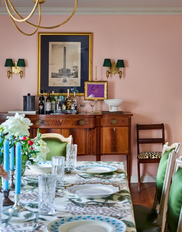 The dining room’s blush-pink walls complement not only every other color in the room but also everyone’s complexion, regardless of the lighting.
