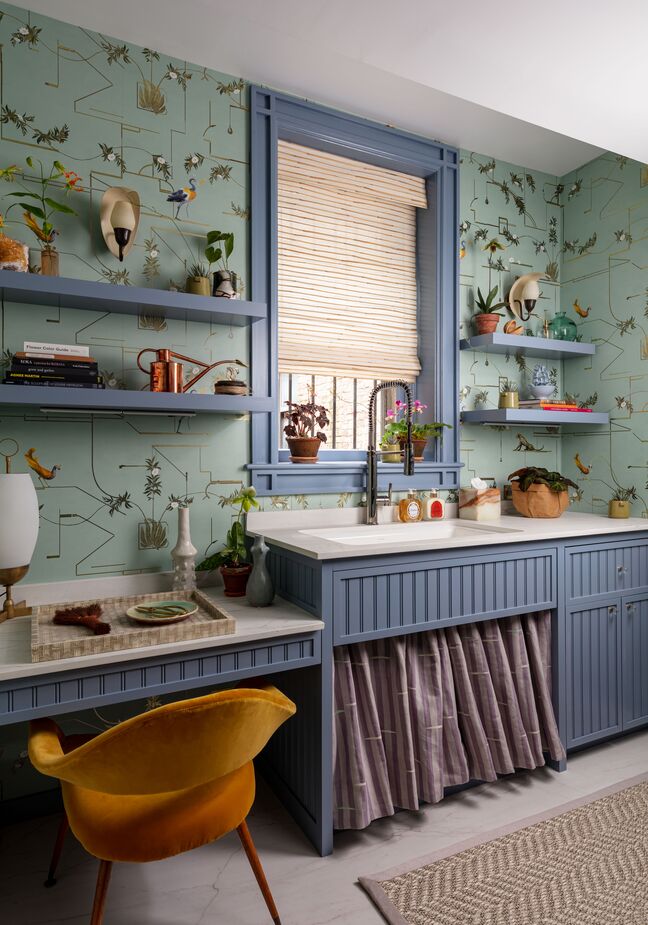 This laundry room by Fairfax Dorn Projects could have you looking forward to running a load of delicates. When not being used as a surface for folding laundry, the counter beside the sink makes a handy desk or table.
