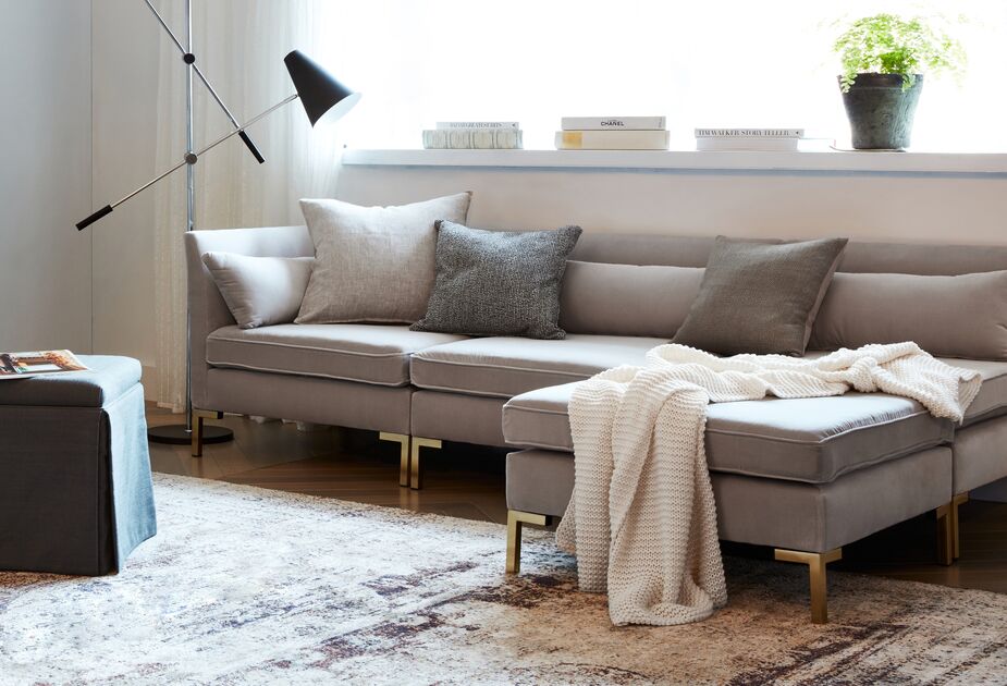 Chic and comfortable seating like the Marceau Velvet Reversible Sectional lets you celebrate your banner year every time you stretch out on it, now and for years to come. Find the floor lamp here. 
