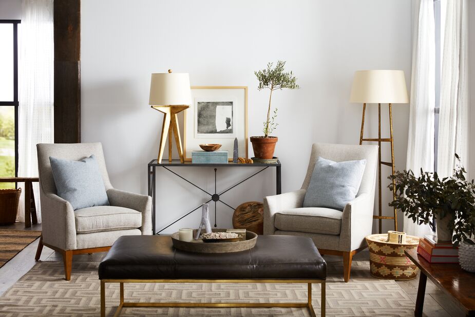 Leather-upholstered ottomans like the one above are as durable as they are handsome. If opting for a fabric ottoman, look for one with stain-resistant upholstery. Photo by Frank Frances.
