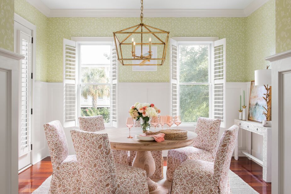 A round dining table like this one makes it easy to squeeze in extra guests. Find the chairs here and the console table here. Room by One Kings Lane Interior Design; photo by Katie Charlotte Lybrand.
