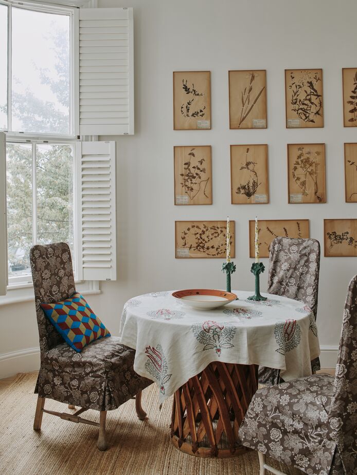 Sally found the dining area’s 11 antique botanic prints in a South of France market while visiting with friends. “We had to divide them up so we could carry them onto the plane and made quite the scene bustling through the airport. I owe them for that!”
