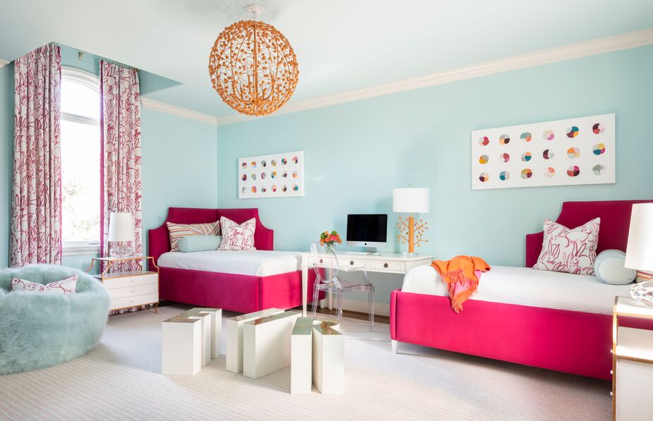 “This tween client insisted on a palette using her favorite colors: turquoise, pink, and orange,” Aileen says. “We were inspired and happily obliged. We designed this room with sleepovers, homework, and playtime in mind and selected pieces that would grow with her through the years.” Photo by Claudia Casbarian for Julie Soefer Photography.
