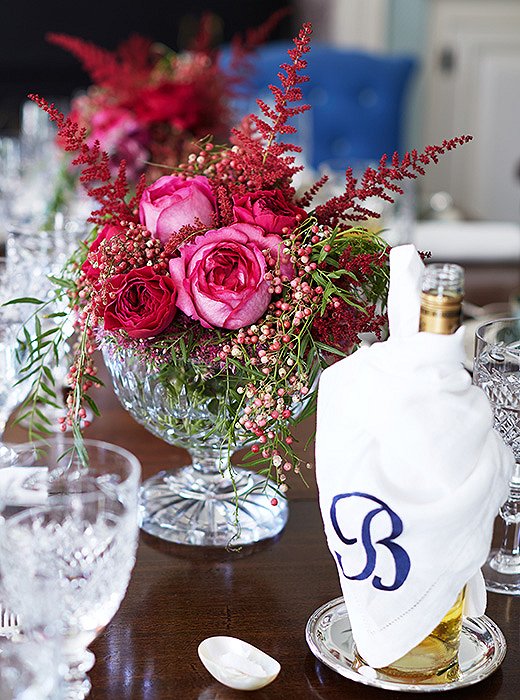 What this lush floral arrangement lacks in height, it more than makes up for in color. The crystal coupe adds to the impact. Photo by Tony Vu.
