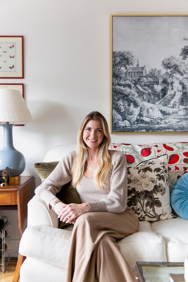 Libby Smith in her apartment. Behind her hangs Countryside Etching Blue, one of her favorite pieces.
