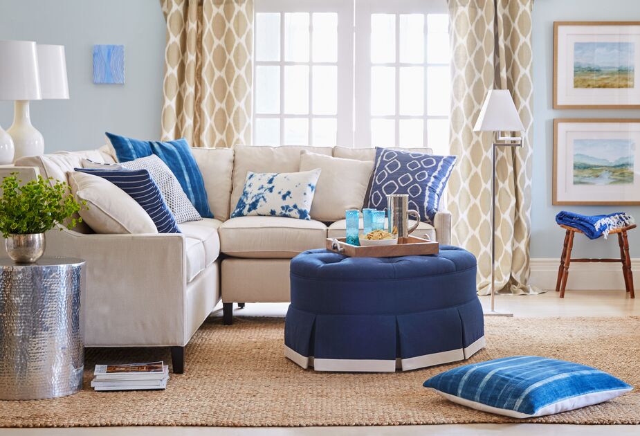 Get the most seating out of a smaller space—or at least that spot in the corner—by opting for an L-shape sectional. Find a similar rug here.

