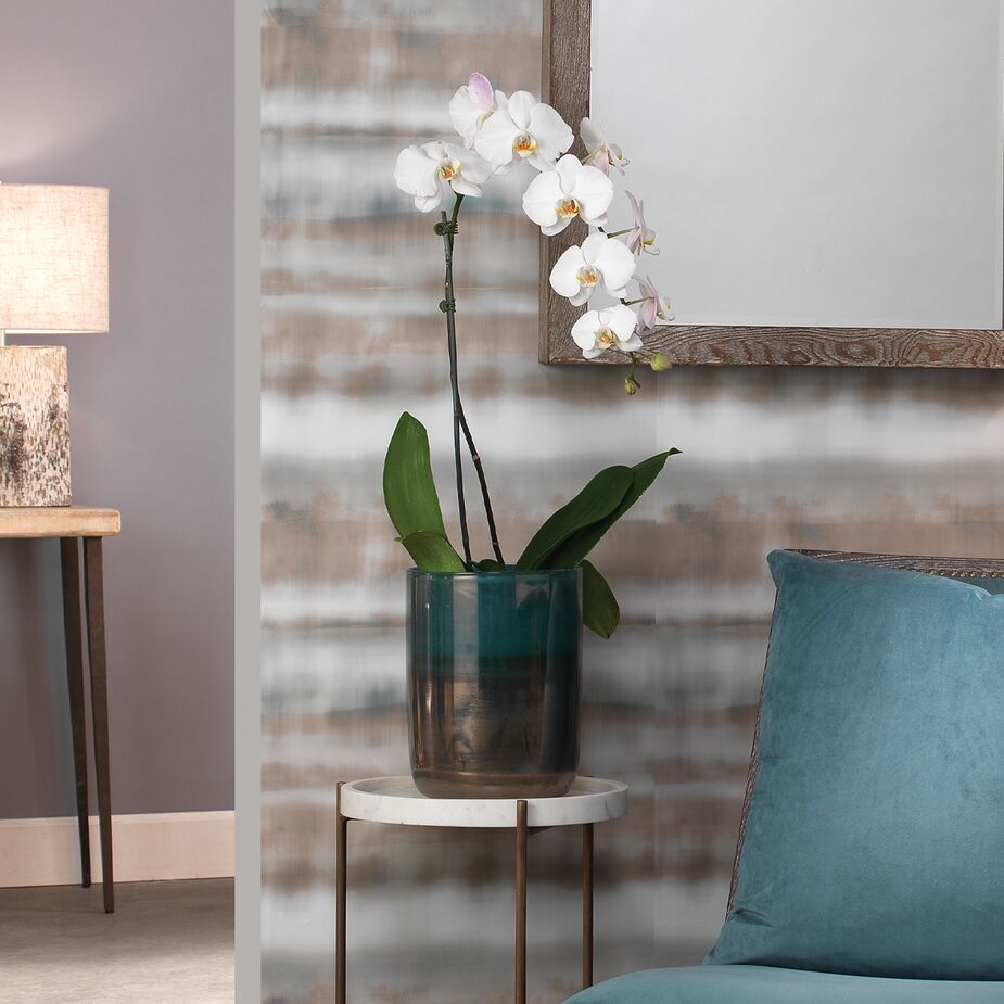 Metal accents add to the ombré tones of the Vaper Vase and make it worthy of display even when it’s not holding flowers.
