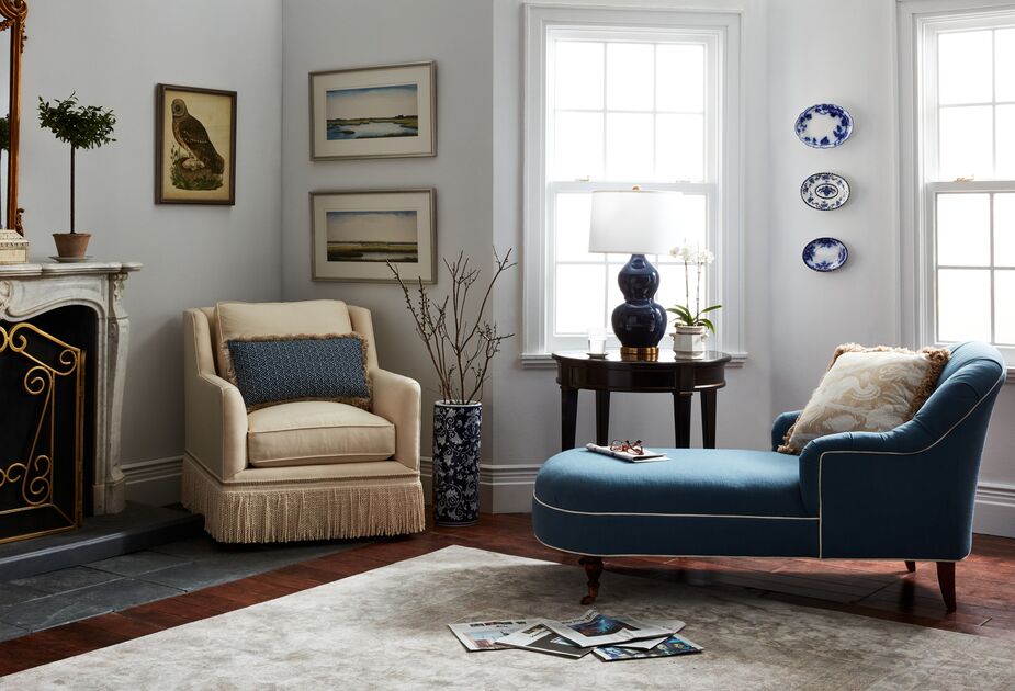 The Marlowe Chaise has the graceful lines and turned legs of a traditional chaise longue, but because the upholstery is solid rather than patterned (and trimmed in contrasting piping to boot), it’s equally well suited for a contemporary space. Find the armchair here.
