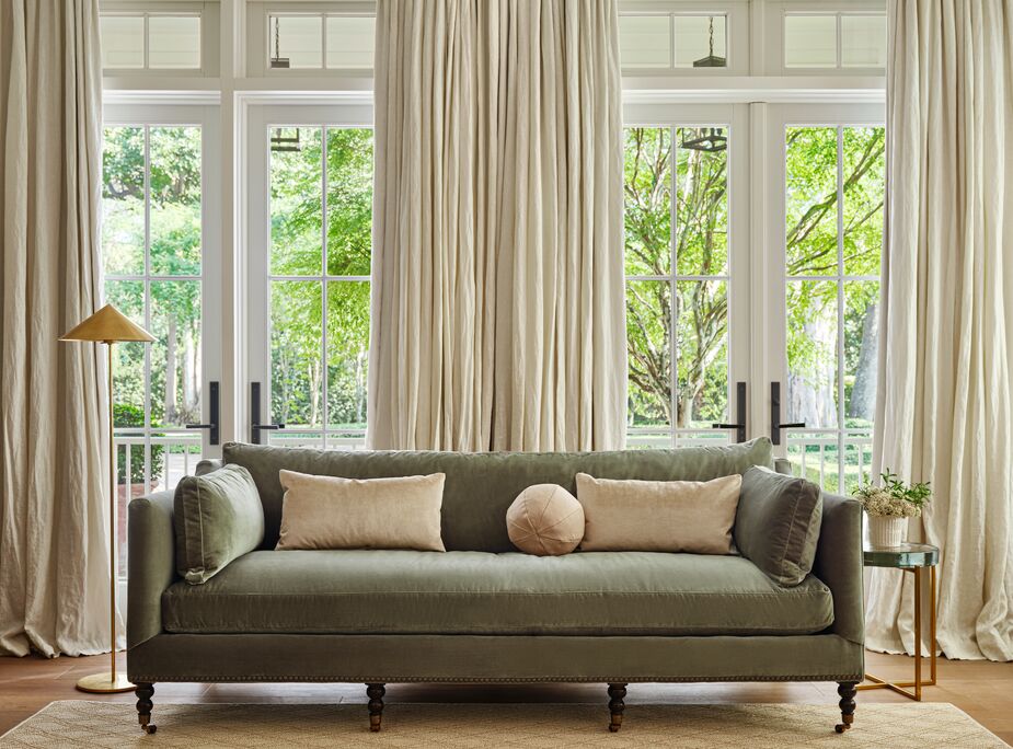 The Margot Sofa retains her crown as our top-selling furniture item. Here she’s shown with the Orsay Medium Floor Lamp, the Ada Long Lumbar Pillow in Dune Linen, and the Emma Ball Pillow in Dune Linen.
