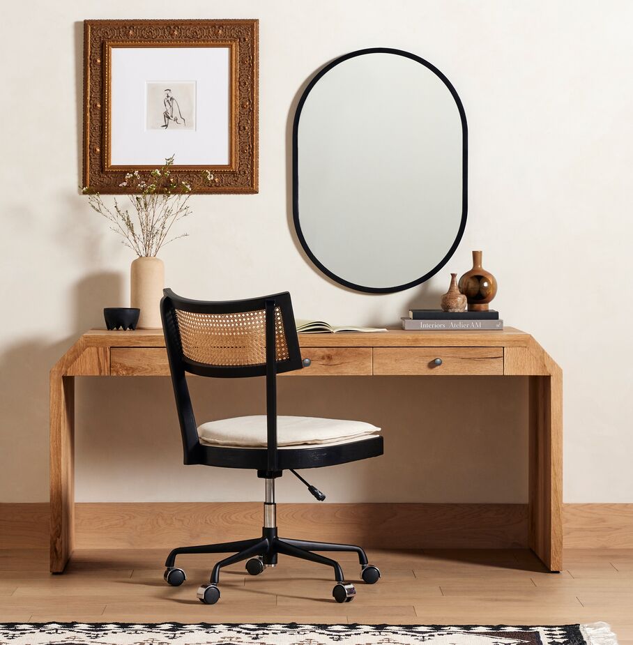 When your wall is your view, dress it up with art, a mirror (like the Canal Wall Mirror above), or both. The Shawna Desk’s three drawers help minimize clutter. Find a similar chair here.

