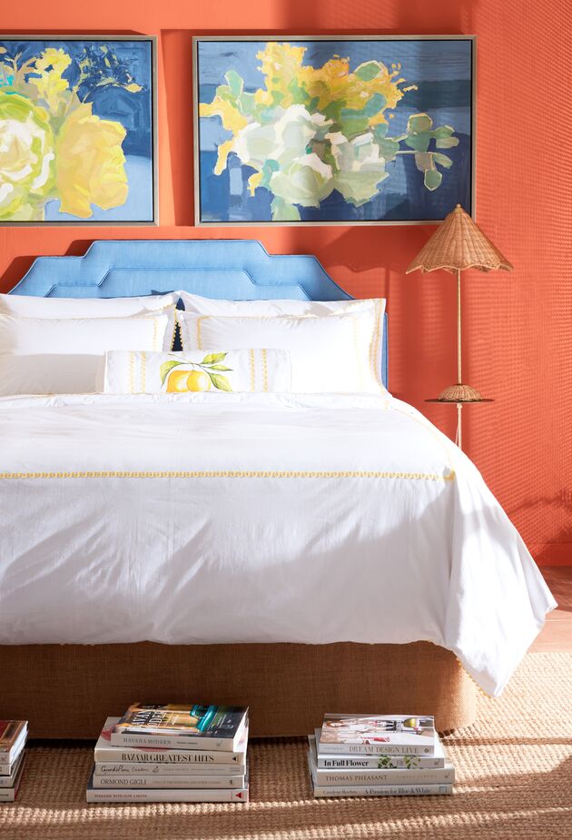 Yellow rickrack adds a dose of sunshine to the white April Sheet Set and Duvet Set. And how fun is that Parasol Rattan Table Lamp? Find the Lola Linen Headboard in French Blue here. Photo by Tony Vu.

