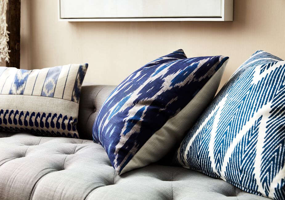 Throw pillows are the perfect low-risk, high-reward purchase: They won’t break the budget, and you can easily swap them out should you tire of them.
