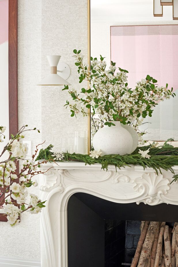 One of Ashley’s suggestions for getting ready for spring: “Mix in tall branches such as my faux cherry blossoms. They add height to any room and that perfect spring touch.”
