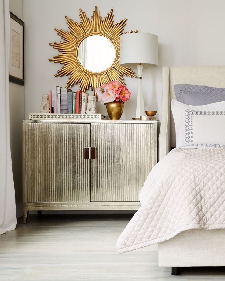 Can’t bear to see your reflection staring back at you first thing in the morning? Instead of placing a mirror across from your bed, put it atop your bedside table.  Find the mirror here. 
