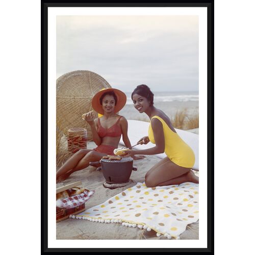 Tom Kelley, Young Women Holding Hot Dog on Beach~P77621338