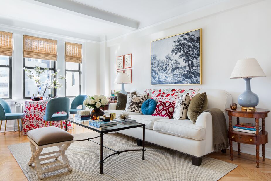 Number 7: “A Designer’s Petite Apartment—and Her Tips on Decorating Rentals.” Libby Smith is the designer in question, and her apartment on Manhattan’s Upper West Side is a charming New Traditionalist-meets-Eclectic haven, as seen in the living/dining area above. Hanging above the sofa is Countryside Etching Blue, which Libby says is a favorite piece. Photo by Jacqueline Clair.
