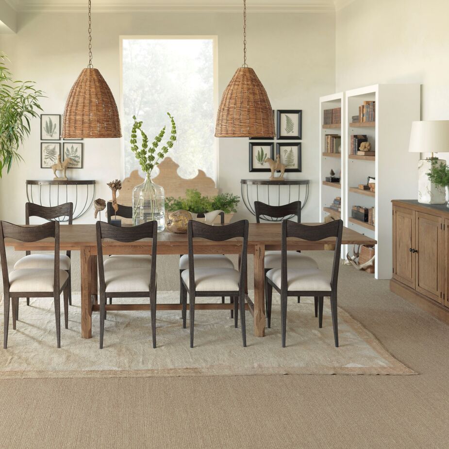 Lauren’s aptly named Forever Table expands from 84 to 124 inches long. Find the Silhouette Side Chairs here and the Stable Consoles on the back wall here.
