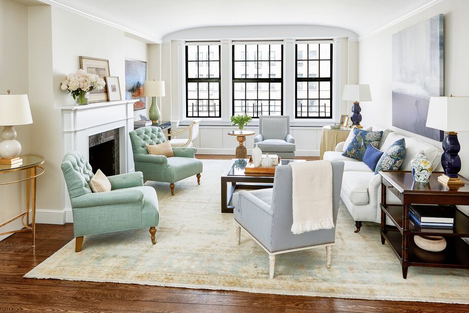 Serene blues and graceful symmetry give this Manhattan living room its restful ambience. So does stain-resistant upholstery, which enables the family of four, which includes two young boys, to really use the space on a daily basis. See more of the makeover here. Design by One Kings Lane Interior Design; photo by Tony Vu.
