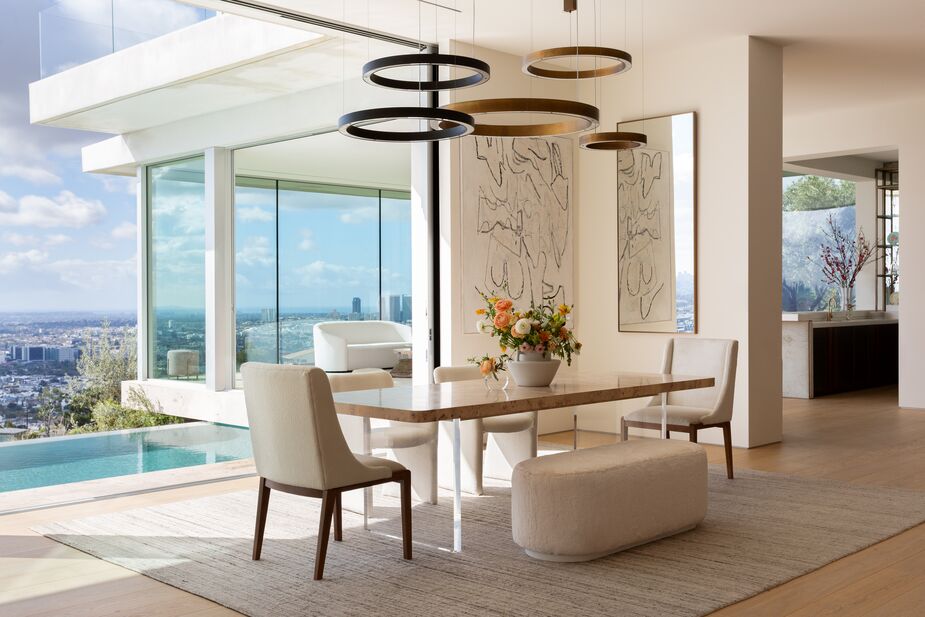 Guests could take their drinks and hors d’oeuvres to the Tranquility Extension Dining Table and relax on their choice of seating: Tranquility Upholstered Dining Chairs , the Tranquility Upholstered Bench, or the Morel Armchairs. Photo by Amy Bartlam.
