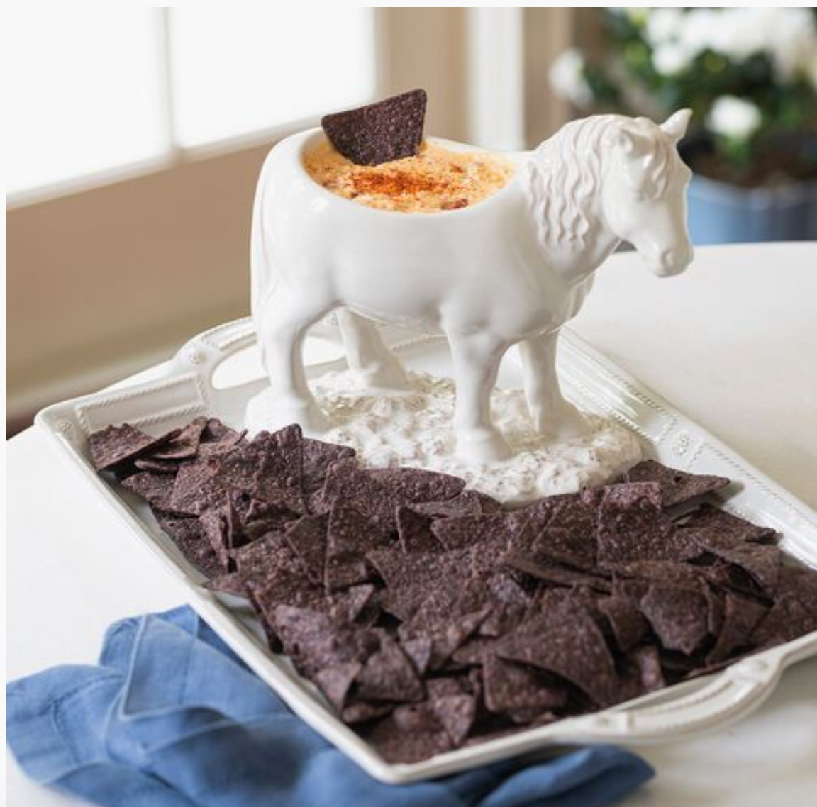 The Claude Horse Serving Bowl from Juliska is a different sort of workhorse: It can serve as a planter as well as a holder of dips and chips.
