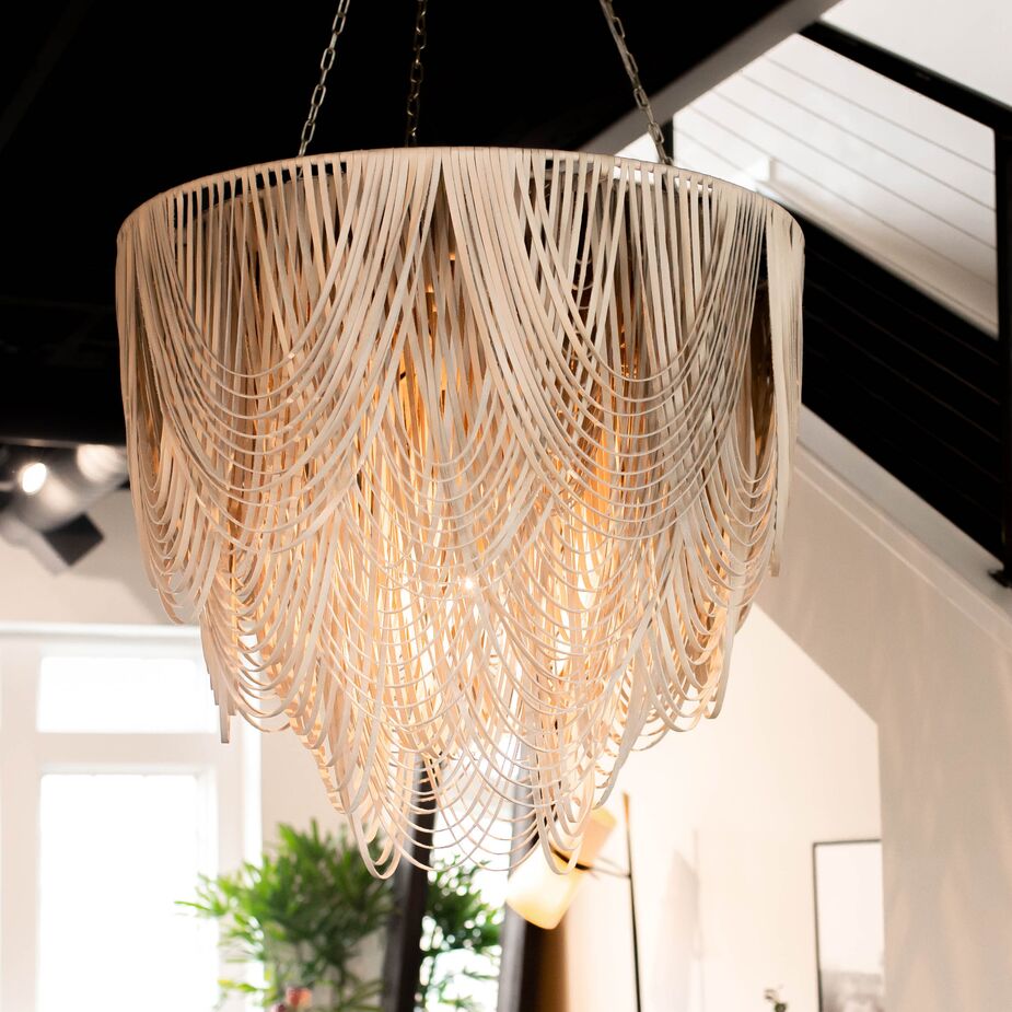 The Whisper Leather Chandelier spotlights the increasingly popular combination of leather and metal.

