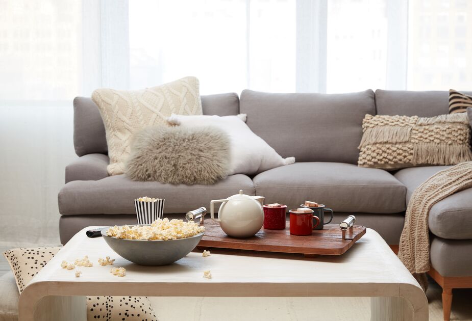 Rooms don’t get more welcoming and carefree than this. Start with a cushiony sectional like the Sutton, add piles of pillows, toss in a throw or two, and voilà! a space made for gathering. Find the lambswool lumbar pillow here and the fringed lumbar pillow here.
